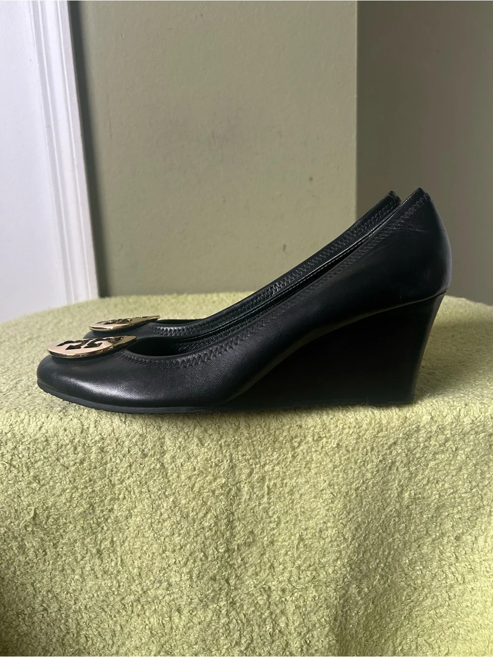Tory Burch Black Leather Logo Round-Toe Wedge Heels with Gold Emblem